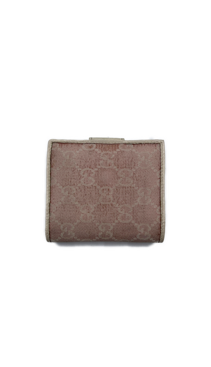 Gucci mini wallet in pink fabric and used leather